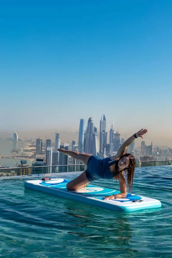 Side plank yoga + Dubai skyline